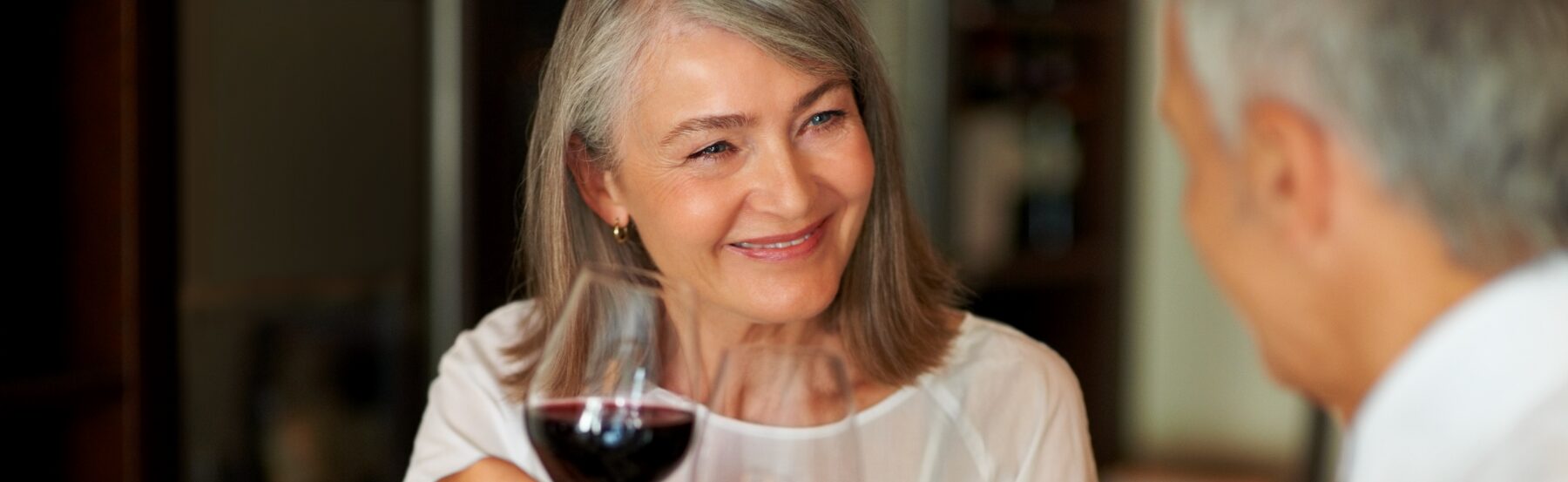 Senior couple drinking wine together